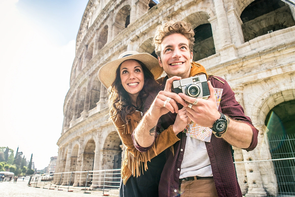 Couple at Colosseum in Rome - Italy