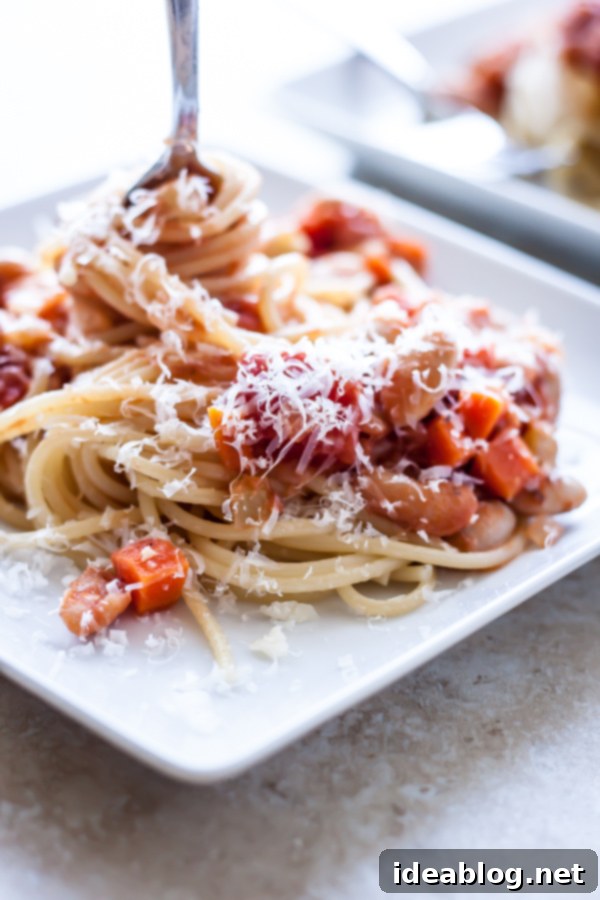 Hearty Cannellini Bolognese Spaghetti 1 featured 10552