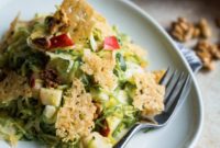 Crunchy Brussels & Apple Salad with Walnuts and Cheesy Crisps