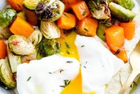 Creamy Goat Cheese Grits with Roasted Brussels Sprouts, Squash, and Poached Eggs