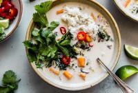Aromatic Thai Coconut Soup with Golden Sweet Potato and Vibrant Kale
