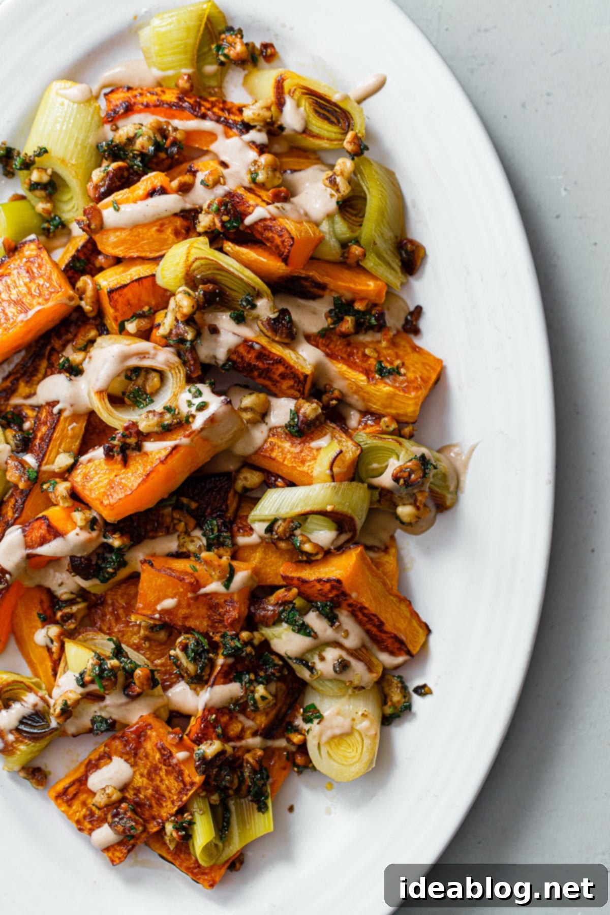 Zaatar Walnut Roasted Butternut Squash and Leeks with Orange Tahini 1 featured 49672