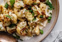 Golden Roasted Cauliflower with Zesty Tahini Mint Drizzle