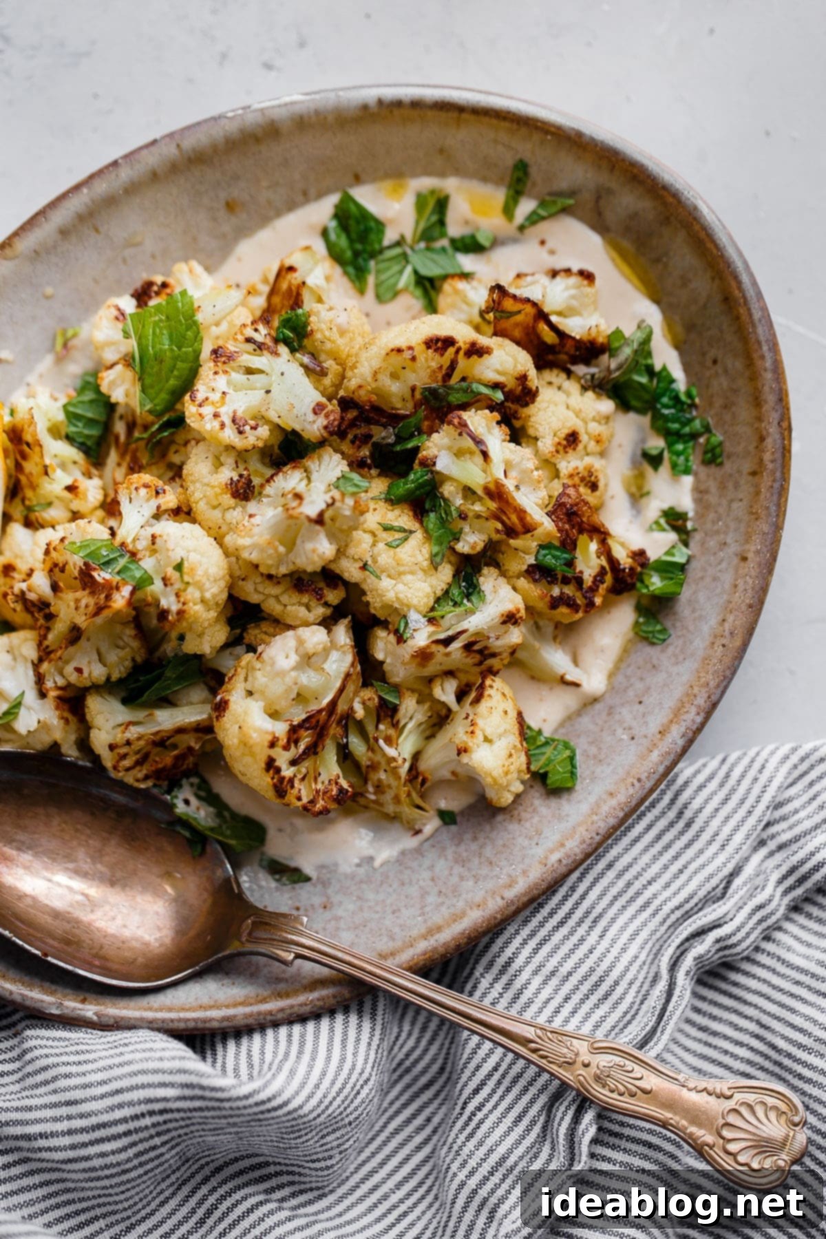 Golden Roasted Cauliflower with Zesty Tahini Mint Drizzle 1 featured 5683