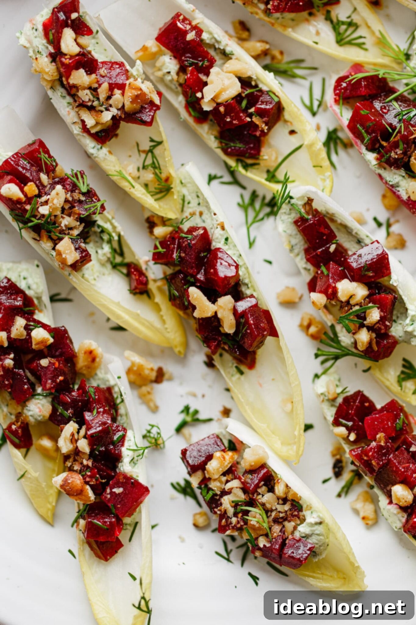 Zesty Beet and Goat Cheese Endive Boats 1 featured 59705