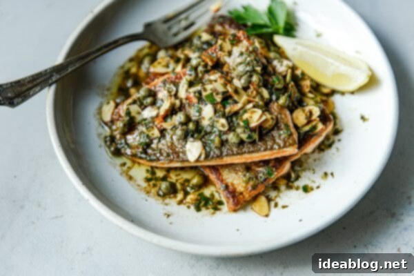 Almond-Kissed Trout 19 Served Trout Almondine with sauce