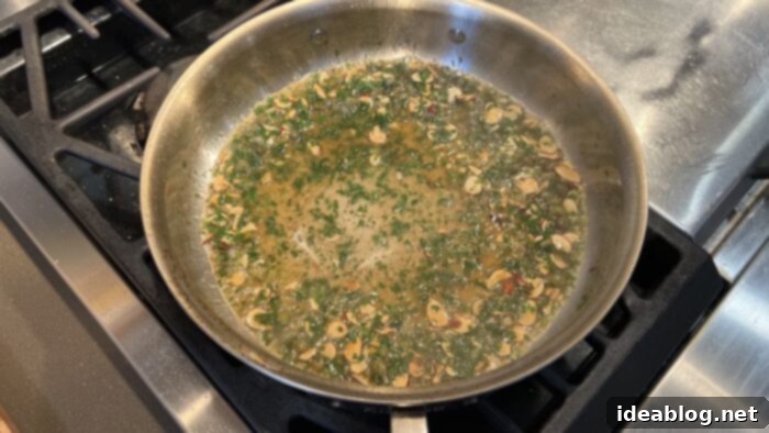 Almond-Kissed Trout 10 Finishing the Trout Almondine Sauce with lemon, capers, and parsley