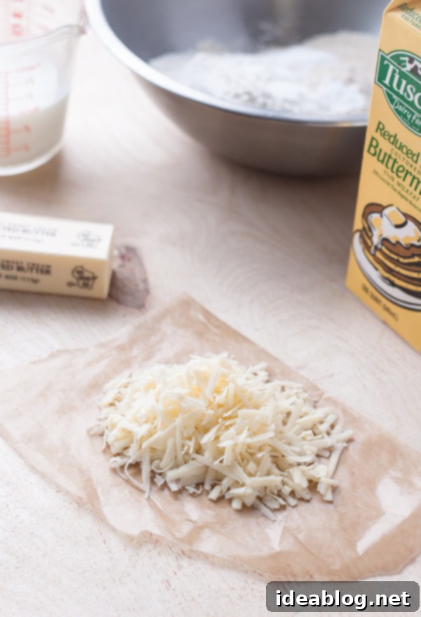 Honeyed Pepper Cheddar Biscuits 3 Essential ingredients for homemade Cheddar Biscuits, including flour, cheddar cheese, and buttermilk