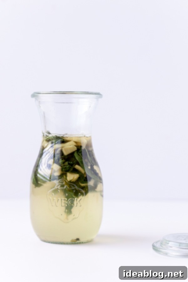 Zesty Ginger Mint Refresher 3 Fresh Mint Ginger Simple Syrup bubbling in a saucepan