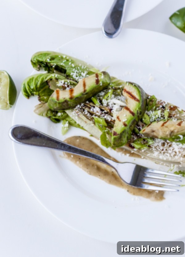 Fire-Kissed Romaine with Zesty Tomatillos, Avocado, and Cotija 2 Grilled Romaine Salad with Avocado, Tomatillos, and Cotija Cheese - A unique and flavorful healthy salad