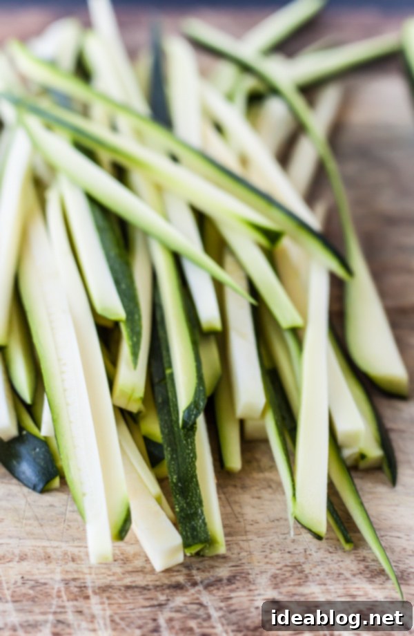 Golden Crispy Zucchini 4 Zucchini Matchsticks prepared for frying