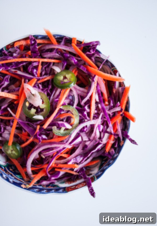 Hearty Cauliflower Steak Burgers with Zesty Slaw 3 Cauliflower Steak Burger with Tangy Coleslaw. Vegetarian burgers made with breaded cauliflower and paired with fresh coleslaw!