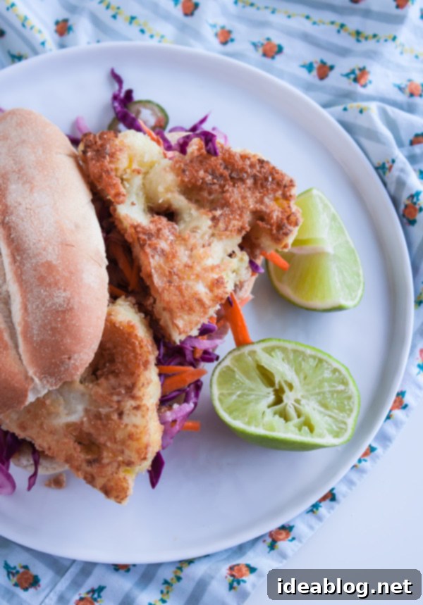 Hearty Cauliflower Steak Burgers with Zesty Slaw 5 Cauliflower Steak Burger with Tangy Coleslaw. Vegetarian burgers made with breaded cauliflower and paired with fresh coleslaw!