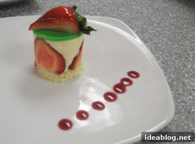 A Two-Day Culinary Journey: Pate, Merguez, Rack of Lamb, and Le Fraisier 6 Individual Le Fraisier dessert with green marzipan and glazed strawberry.