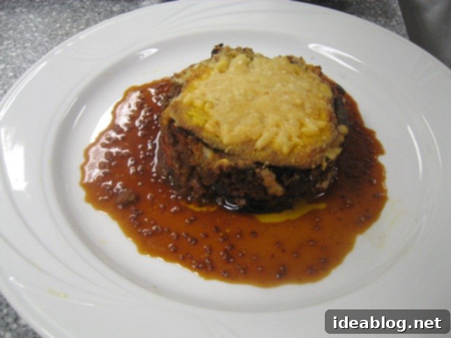 Day 82 Featuring Braised Calamari Moussaka and Gateau Lion D'Or 5 Individual moussaka portions with lamb jus