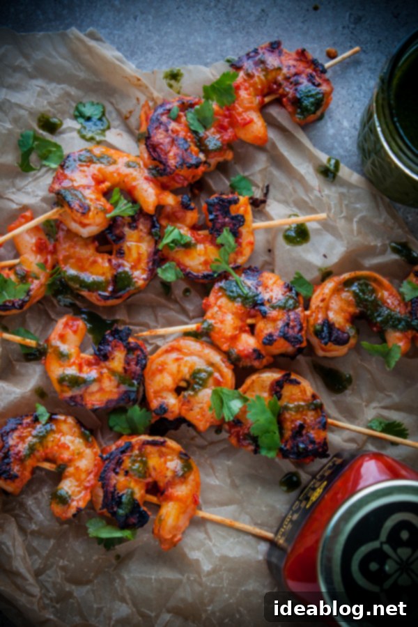Fiery Harissa Shrimp Skewers with Zesty Basil Oil 2 Grilled Harissa Shrimp Skewers with Basil Oil