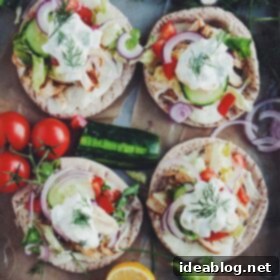 Spiced Feta Chicken Pitas with Cool Tzatziki 9 Homemade Chicken Pitas with Jalapeño Whipped Feta and Quick Tzatziki