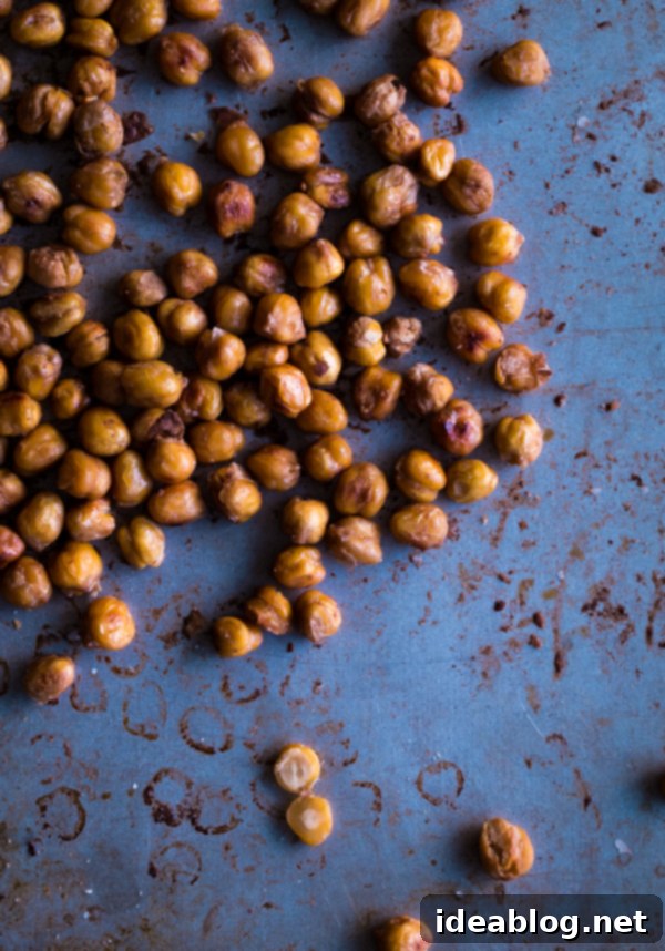 Salt and Vinegar Roasted Chickpeas. A easy, protein and fiber-packed healthy snack that you won't be able put down! #chickpeas #glutenfree #recipe #snacks #abeautifulplate #recipe Perfectly Golden Salt and Vinegar Roasted Chickpeas