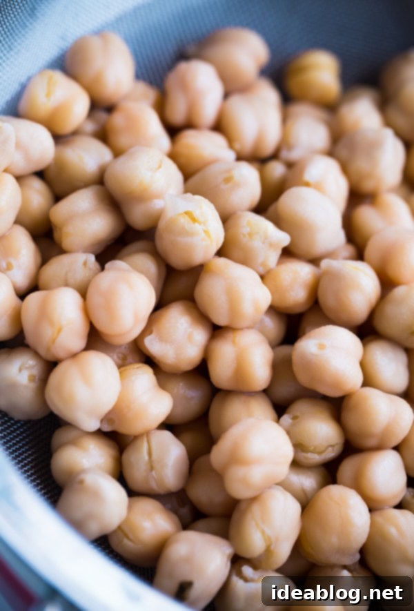 Salt and Vinegar Roasted Chickpeas. A easy, protein and fiber-packed healthy snack that you won't be able put down! #chickpeas #glutenfree #recipe #snacks #abeautifulplate #recipe Drained Chickpeas Ready for Roasting