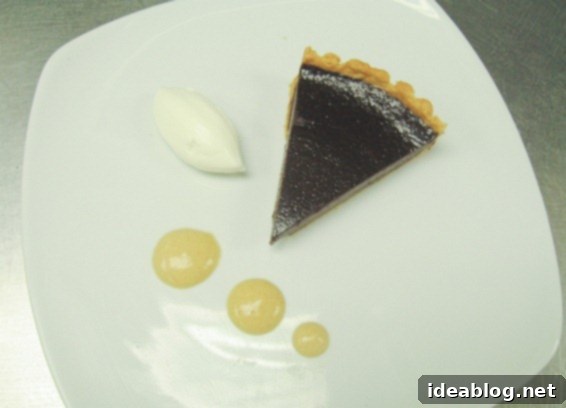 Day 66: Skate, Steak Poivre Noir, and Chocolate Tart 6 Luxurious chocolate tart with whipped cream and hazelnut sauce