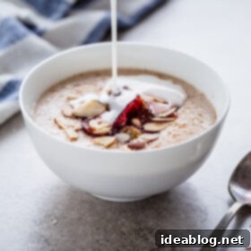 Plum Coconut Farro Comfort 3 Broken Farro Porridge with Coconut Milk, Almonds, & Roasted Plums