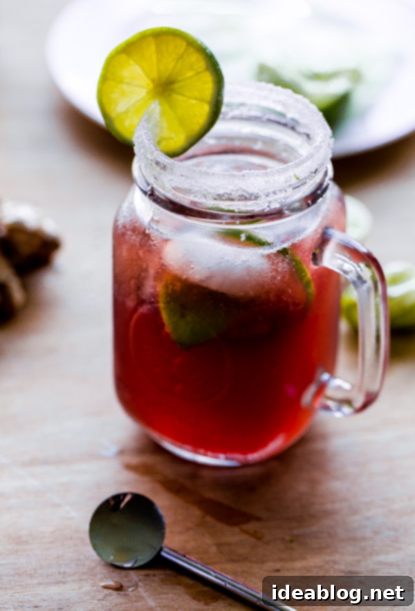 Garnet Ginger Mule 2 Refreshing Pomegranate Moscow Mule in a copper mug with lime and arils