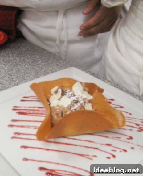 Day 60: Hearty Sausage, Classic Basquaise Chicken, and Rich Chocolate Mousse 5 Elegant chocolate mousse served in a delicate tulip cookie with chocolate shavings