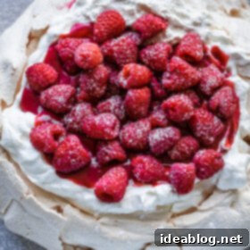 Berry Burst Pavlova with Vanilla Whipped Cream 8 Raspberry Pavlova with Vanilla Whipped Cream