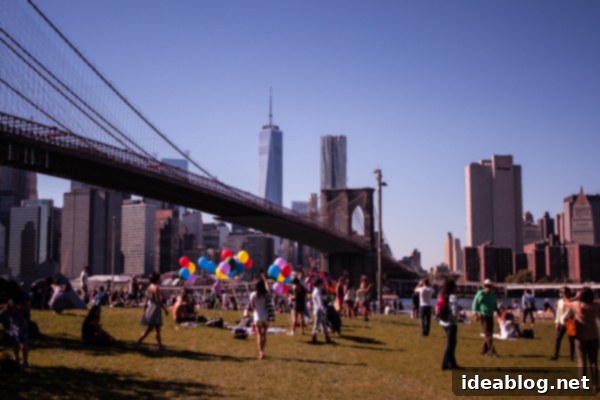 The Fleeting Pulse 9 A picturesque view of Brooklyn Bridge Park, with its lush greenery contrasting against the backdrop of the city skyline and the historic Brooklyn Bridge.