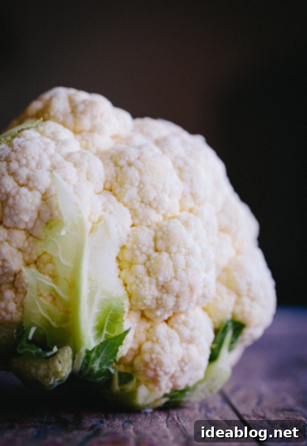 Roasted Cauliflower with Pomegranate Gems, Fresh Mint, and Toasted Almond Crunch 4 Whole Head of Cauliflower