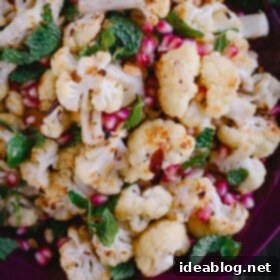 Roasted Cauliflower with Pomegranate Gems, Fresh Mint, and Toasted Almond Crunch 7 Roasted Cauliflower with Pomegranate Arils, Mint, and Toasted Almonds