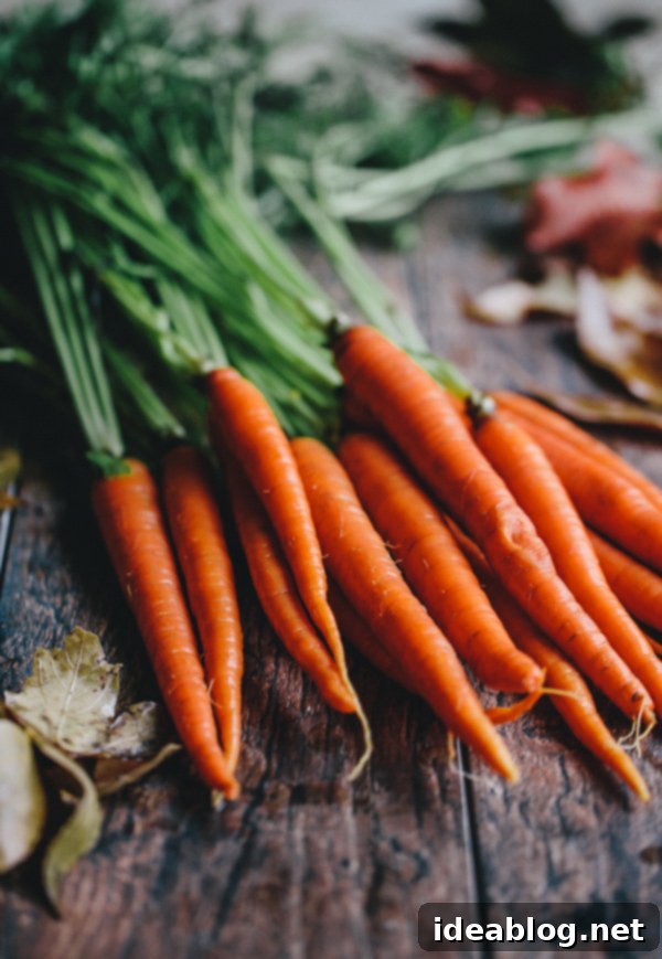 Vibrant Roasted Carrots with Green Tahini and Pomegranate Jewels 3 Whole Carrots with Stems Attached