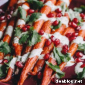 Vibrant Roasted Carrots with Green Tahini and Pomegranate Jewels 7 Roasted Carrots with Green Tahini Sauce and Pomegranate