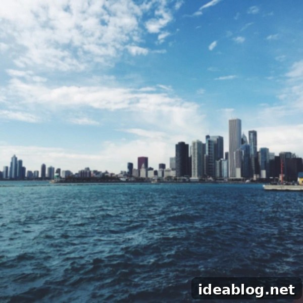 The Sunday Sentinel 2 A stunning panoramic view of Chicago, Illinois, showcasing its iconic skyline, deep blue lake, and vibrant urban landscape.