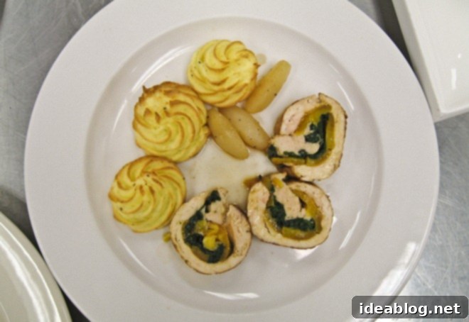 A Trio of French Delights: Chicken Roulade, Pommes Duchesse, and Marjolaine 7 Chicken roulade served with pommes duchesse