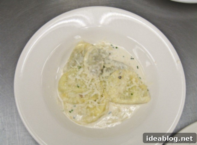 Day 42: A Culinary Journey of Savory and Sweet 9 Cooked ravioli plated with chive cream sauce