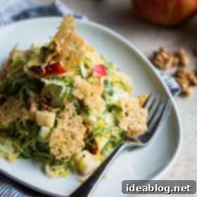 Crunchy Brussels & Apple Salad with Walnuts and Cheesy Crisps 8 Brussels Sprouts Apple Salad with Walnuts and Cheese Crisps
