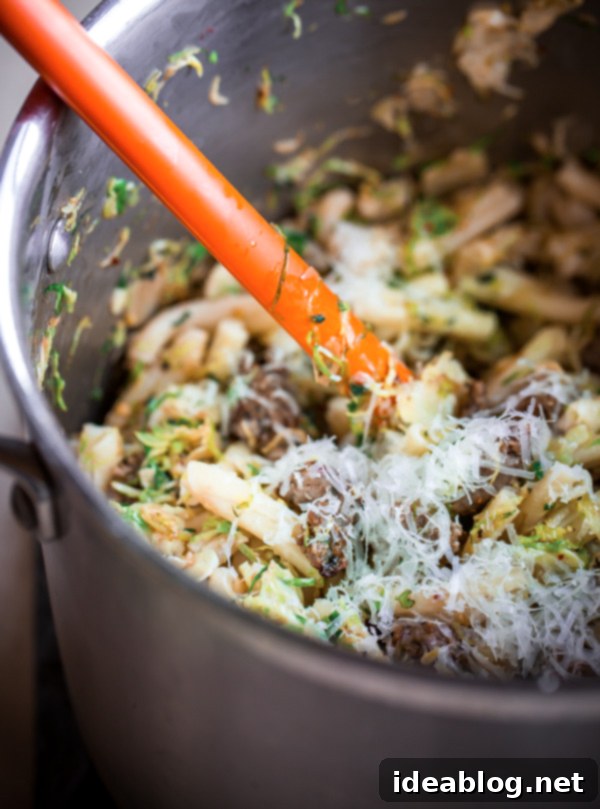 Strozzapreti with Pork Sausage, Crisp Brussels, and Fresh Sage 5 Strozzapreti pasta with pork sausage, generously coated in shaved Brussels sprouts and sage