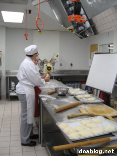 Day 33: A Slice of Pizza Heaven 5 culinary student making pizza dough