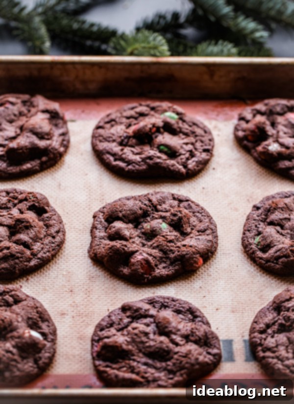 Minty Chocolate Holiday M&M Treats 4 Several M&M Holiday Mint Chocolate Cookies stacked, showcasing their texture