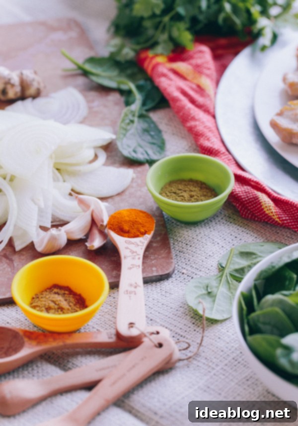 Slow-Braised Indian Chicken and Chickpea Curry 3 Key ingredients for Braised Indian Chicken: chicken, chickpeas, spinach, and spices