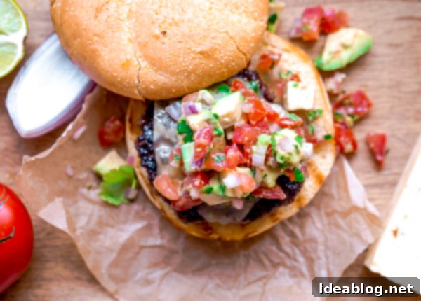 Zesty Southwest Avocado Jack Burgers 9 Close-up of Southwest Burger with Pepper Jack Cheese and Avocado Salsa