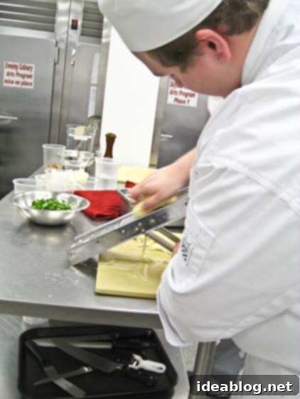 Day 24 French Feast Artichoke Chasseur Napoleon 6 Culinary Student Using a Mandoline for Pomme Darphin