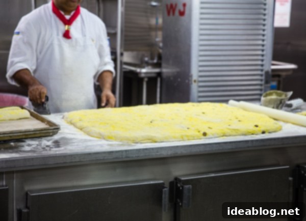 Island Immersion Chapter Two 32 Pastry chef meticulously preparing desserts in the cruise ship kitchen