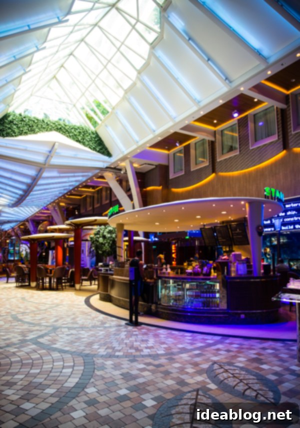 Island Immersion Chapter Two 8 The Royal Promenade, a vibrant mall-like area on Royal Caribbean's Oasis of the Seas