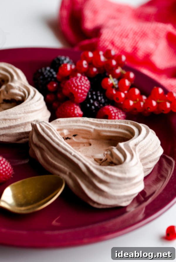 Sweetheart Chocolate Meringue Berry Delights 6 Chocolate Heart Meringue Cups with Whipped Cream and Berries. An elegant, simple dessert for Valentine's Day!