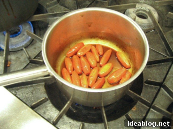 Day 16: French Bistro Delights 6 Perfectly tourneed and glazed carrots, showcasing precise knife skills and delicate cooking techniques.