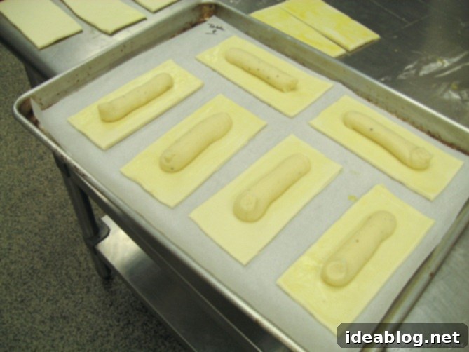 Day 16: French Bistro Delights 9 Assembled L'Allumette au Fromage, with two puff pastry rectangles sealed around the Mornay filling, ready for baking.