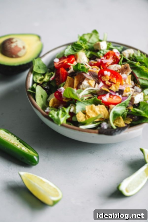 Emerald Guacamole Greens with a Zesty Jalapeño Lime Infusion 2 Guacamole Greens Salad served in a bowl
