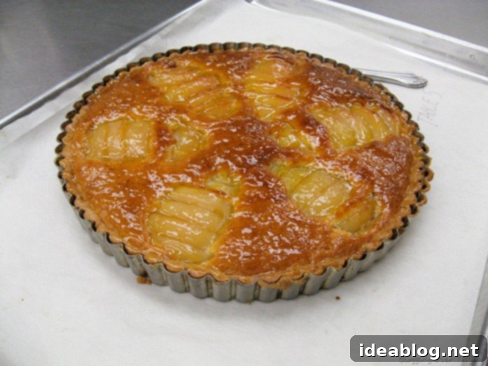 Day Eleven's French Feast: Velvety Veal and Sweet Pear Tart 3 Baked Poached Pear Tart with Apricot Glaze